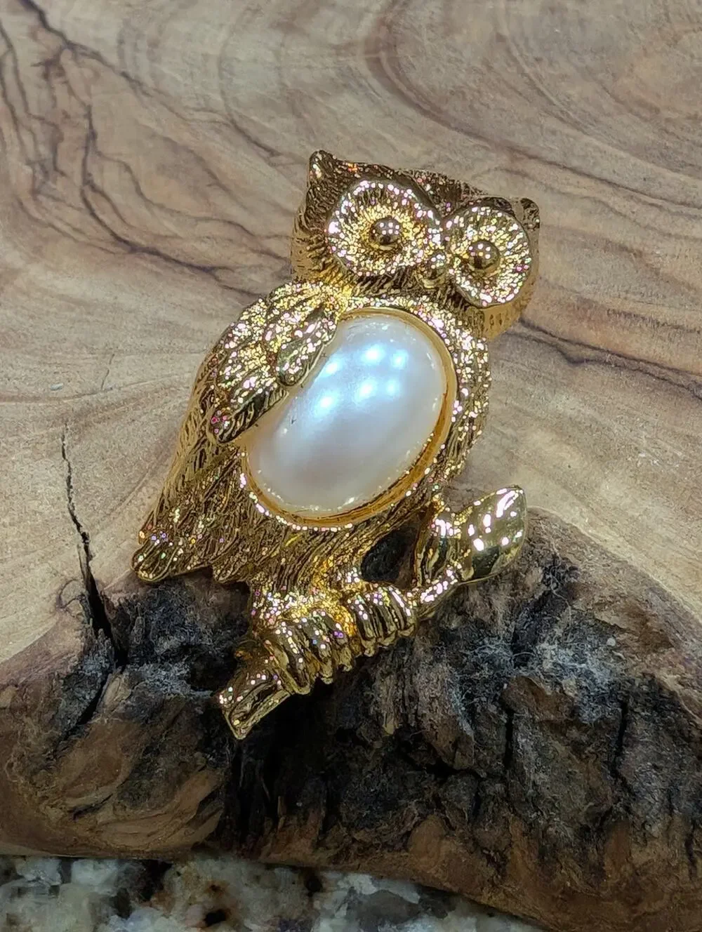 Avon gold tone owl pin back, with a large faux pearl body 1995